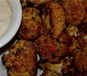 Spicy Cauliflower coated in spices with yogurt dip